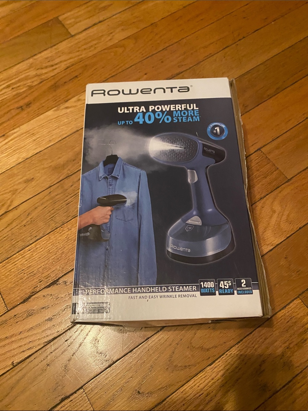 Rowenta handheld steamer in navy and silver